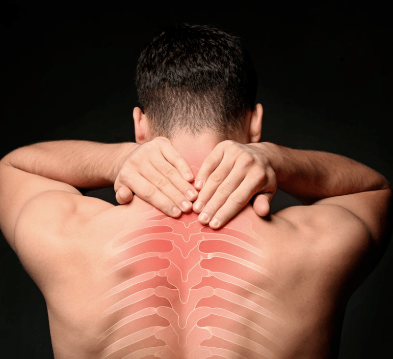 A man worries about osteochondrosis of the thoracic spine